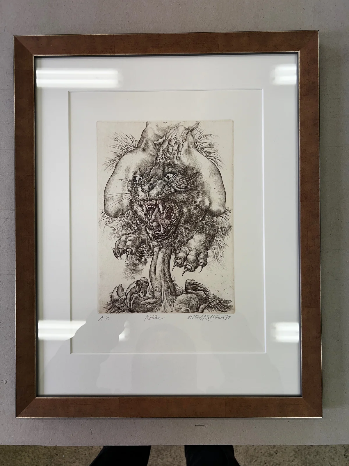 Drawing in a wooden frame with a spacious white mount