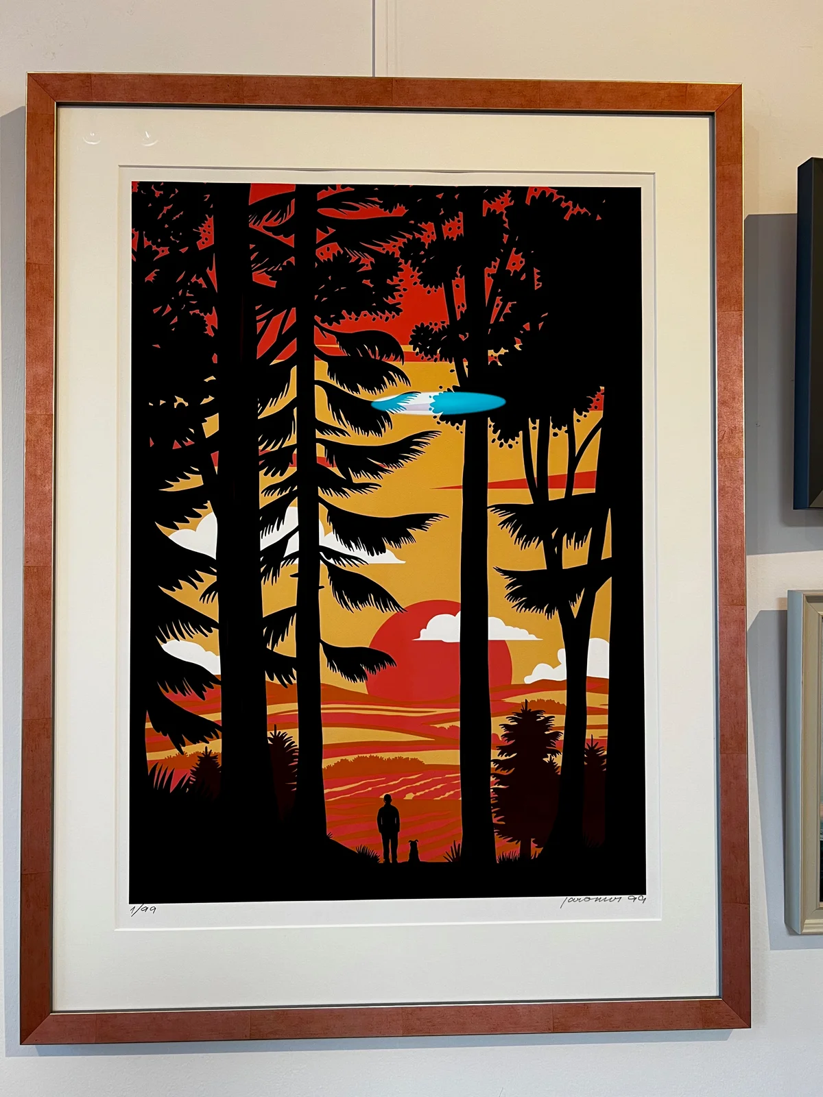 Grafika krajiny v dřevěném rámu s bílou paspartou